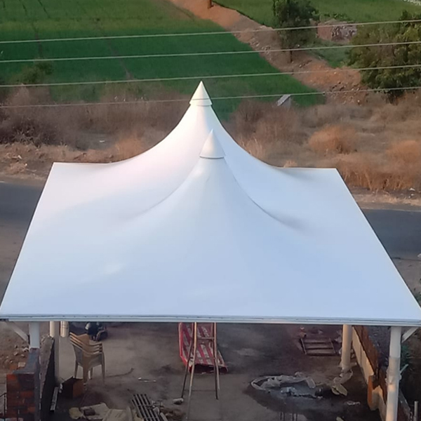 Tensile roofing over spectator seating at a sports facility in Pune