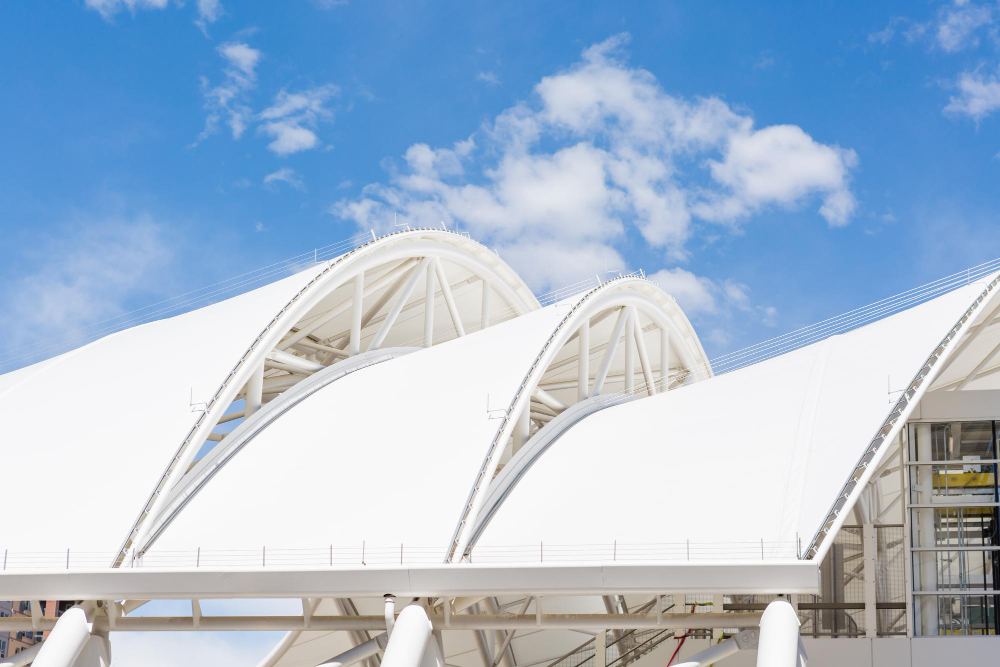 White vault membrane tensile structure against blue sky