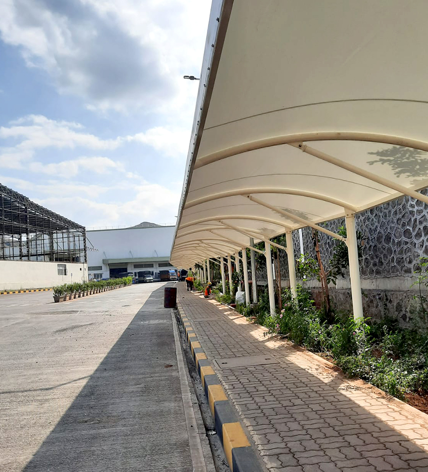 Large awning tent structure over a walkway